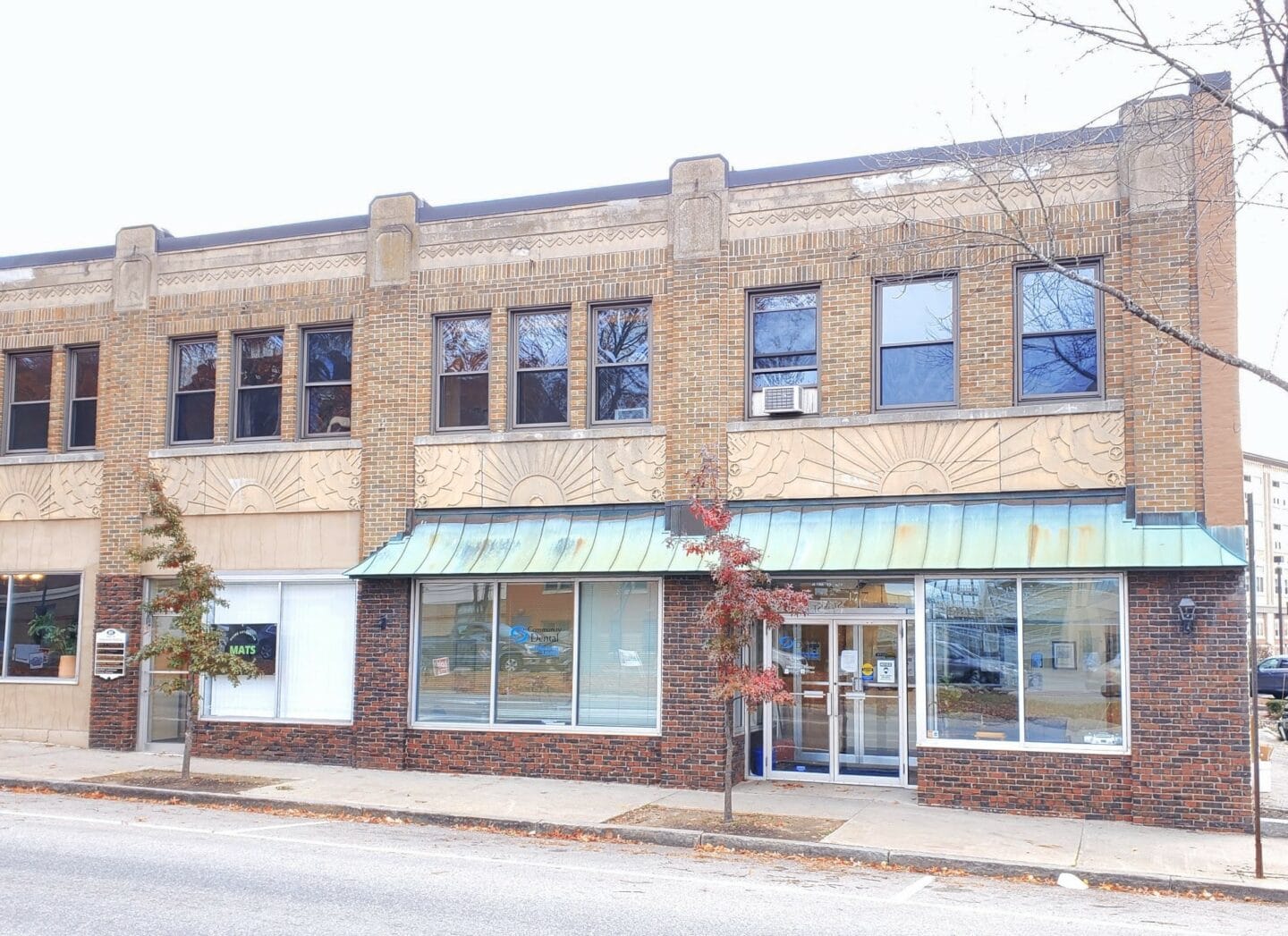 Building and front entrance of Community Dental in Lewisotn